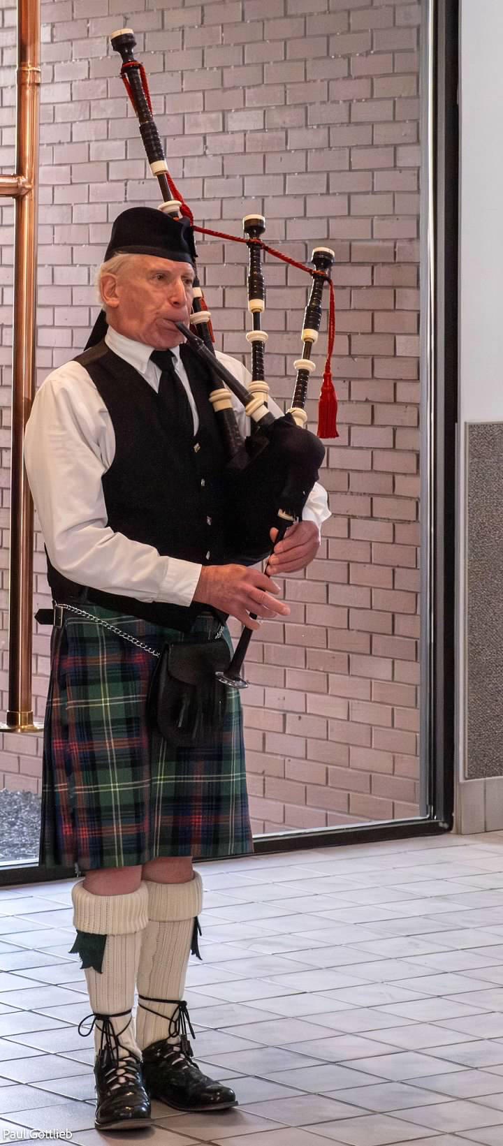 Brian Widelitz Performing at Concerts and Festivals Brian Widelitz playing bagpipe during a performance
