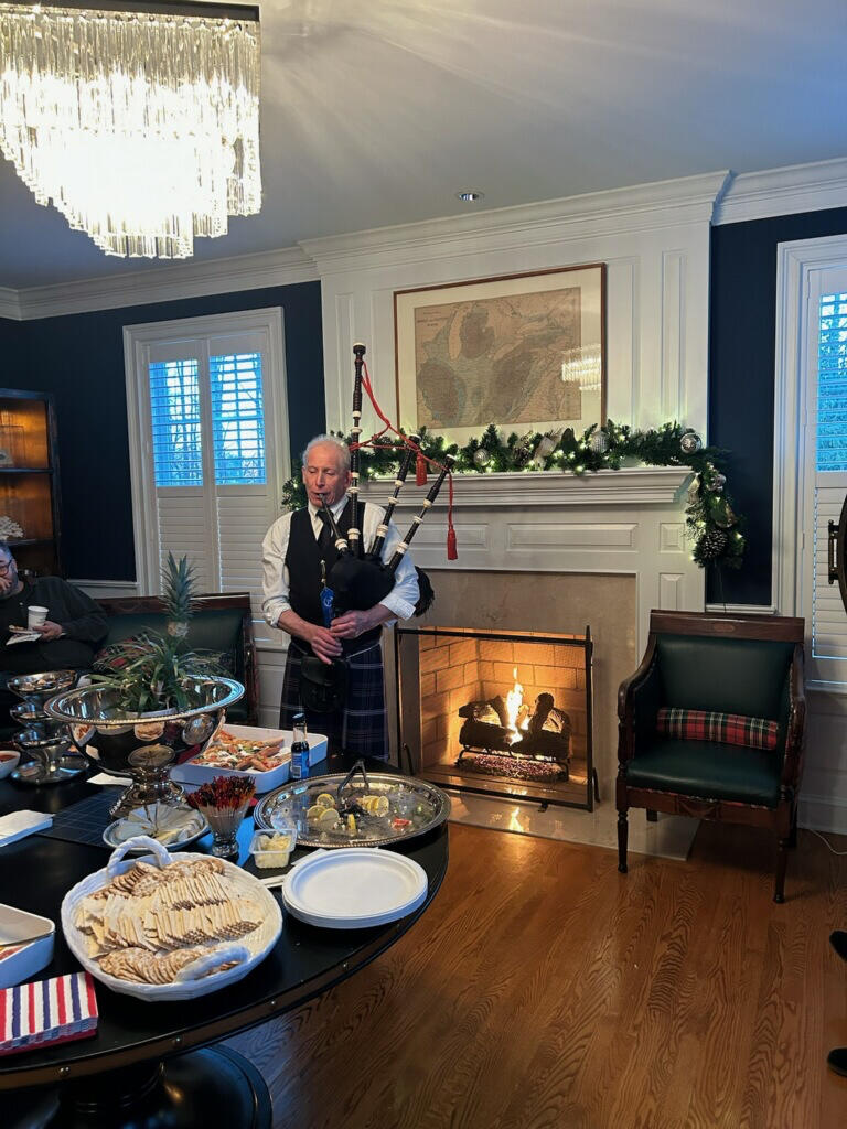 Brian Widelitz playing a bagpipe
